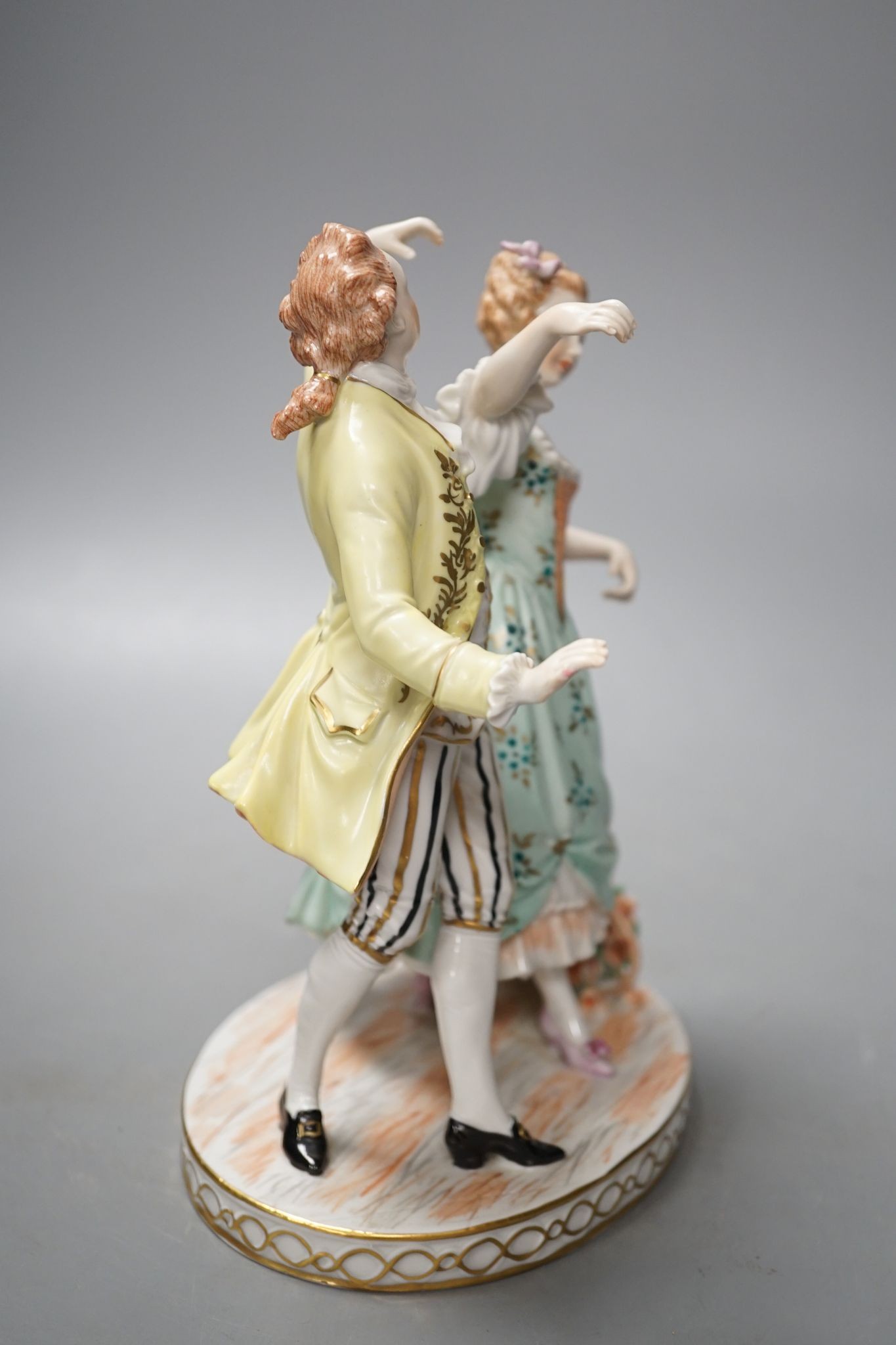 A Dresden porcelain group of a dancing couple 21cm